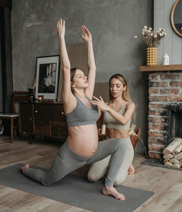 Woman feeling energized during a light home workout.